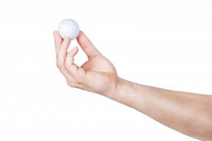 The golf-ball exercise is an easy way to get a $100 hand/foot reflexology treatment for less than one dollar. 