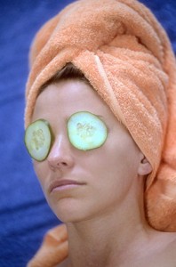 Close your eyes and cover them for 15 to 20 minutes with raw sliced cucumber or potato. 