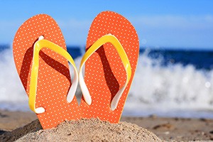 Look at your toes while wearing flip-flops. The distal part of your toe is trying to flex down (planter flex) to hold the flip-flop on while the other part of your toe (middle) is trying to bridge up (dorsi flex). Unfortunately, your toes should be doing exactly the opposite. 